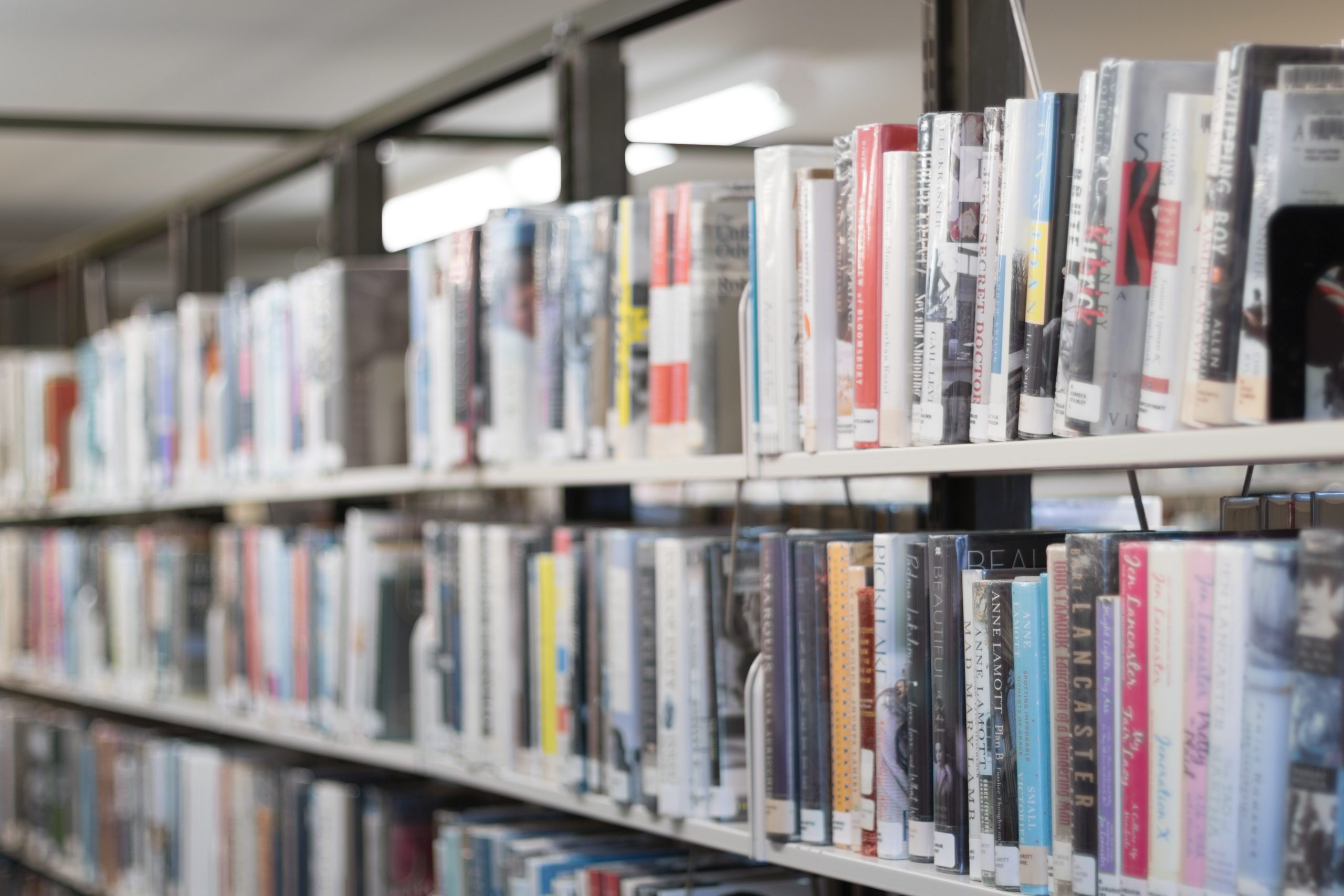 shallow-focus-photography-of-books-on-bookshelves-1184589